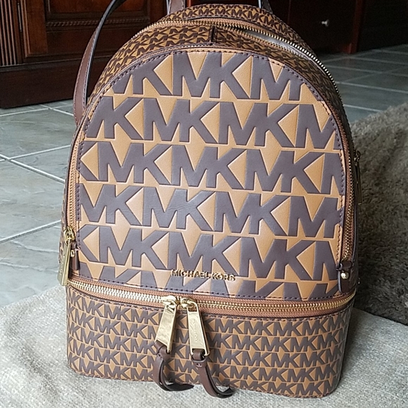Michael Kors Handbags - NWT Michael kors Backpack